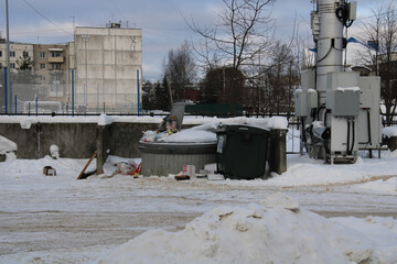 the city's garbage dump, a full garbage dump, garbage cans in winter,