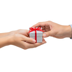 Hands exchanging small gift box with ribbon.