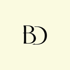 Obraz premium Elegant Intertwined B and D logo design. BD monogram. Modern, sophisticated branding symbol suitable for luxury fashion, design studios, and editorial logos.