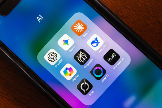 Quito, ECUADOR - Oct 13 2025 : Various artificial intelligence chatbot apps (ChatGPT, Gemini, Claude, Copilot, Perplexity, DeepSeek, Grok, Meta AI and Character.ai) are seen on an iPhone.