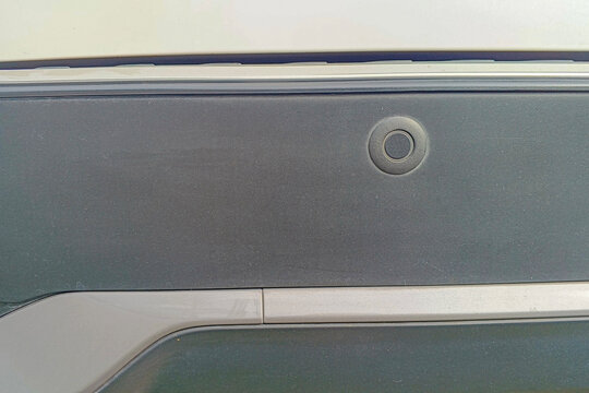 Close up Parking Distance Control (PDC) on the rear bumper of a car. Automotive industry concept. For graphic design, 3D rendering and banners