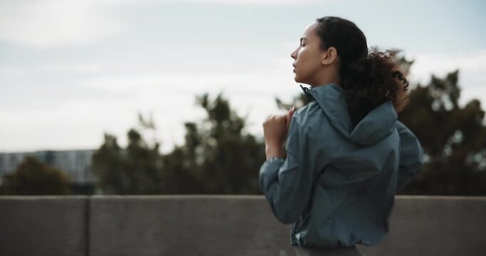 Running, check watch and woman in city for fitness, timer or heart rate for cardio health. Workout, jog and person with wristwatch for pace, VO2 max or exercise with performance metrics on bridge