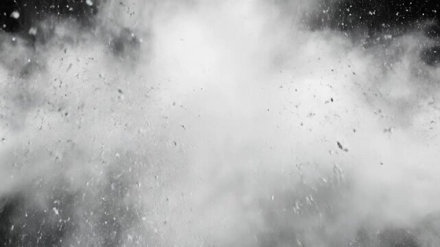 Black cloud particles with white powder burst concept. White powder explosion with dust particles flying in the air on black background high speed capture
