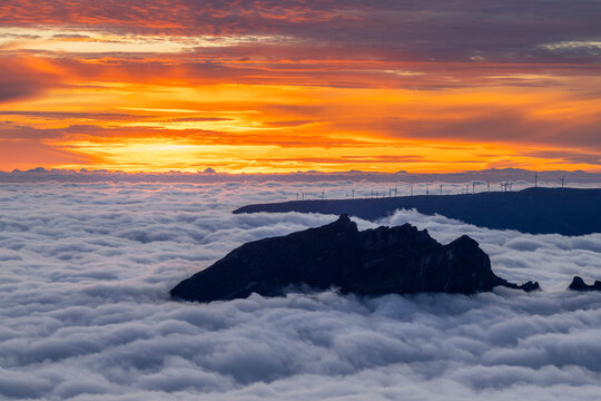 Dramatic sunset above Pico do Arieiro mountain and clouds Madeira