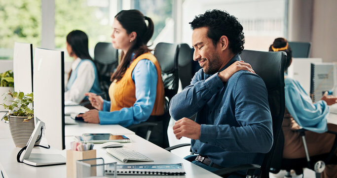 Computer, business man or shoulder pain in office with muscle fatigue, article pressure or workload. Coworking, journalist or joint ache at publishing agency from poor posture or overworked on story