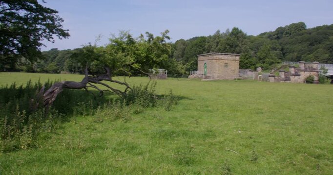 Extra wide panning shot of the Thirlmere aqueduct waterworks, on the river Lune
