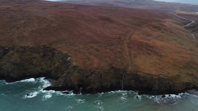 Panning drone shot over the village of Aird Uig on the Isle of Lewis.
