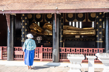 Separate fragments of a decorated Buddhist temple in Thailand on a sunny day