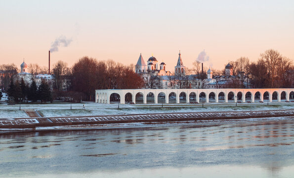 Panoramic spring view of an anceint arcade and churches of Yaroslav's Courtyard at sunset in Veliky Novgorod, Russia
