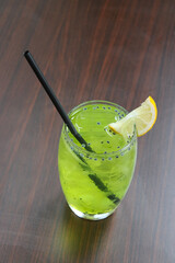 Refreshing Iced Green Melon Drink with Basil Seeds and Lemon