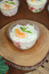 Fresh Fruit Salad Dessert With Shredded Cheese