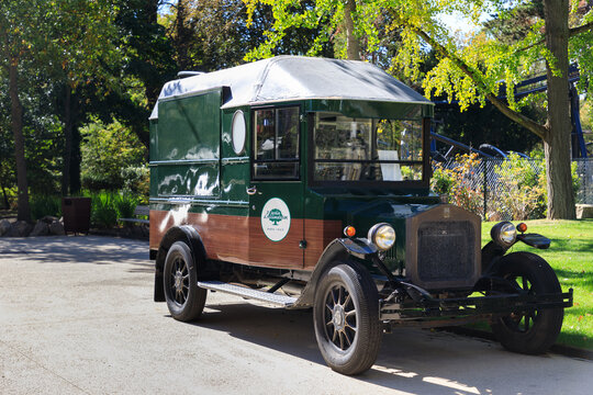 Paris, France - September 26 2018: Closed cafe on wheels in an old car parked in amusement park of Jardin D'Acclimatation