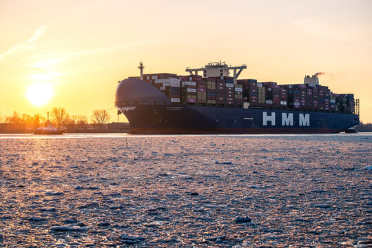 Hamburg Germany 2026 01 18: Huge Container vessel on the frozen Elbe River in Hamburg