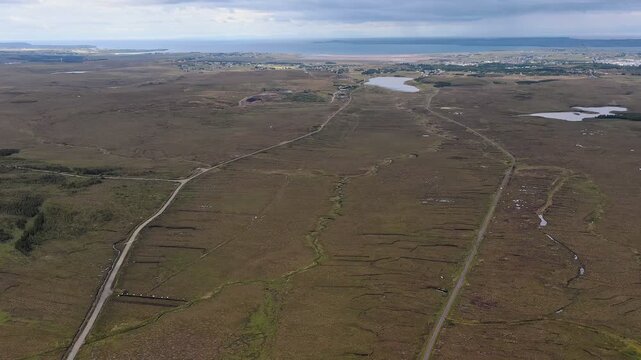 Drone shot of peat roads on the moorland landscape around Stornoway on Lewis.