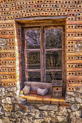 Closed Old Traditional Window on an Old Wall