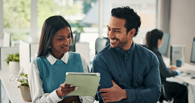 Business, people and smile with tablet discussion for article feedback, story review and planning. Journalist, editor or tech at coworking agency for blog fact checking, newsletter advice or teamwork