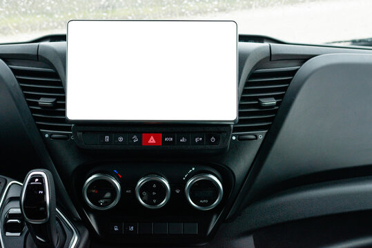 Central car dashboard with blank tablet screen and controls