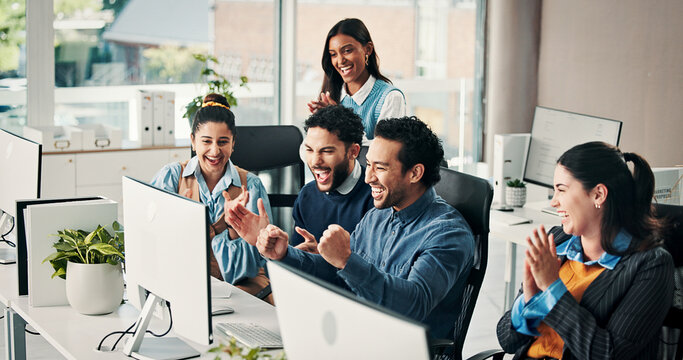 Business people, team and applause with win at computer for campaign success, positive feedback and fist pump. Coworking, happy employees and online announcement for marketing project achievement