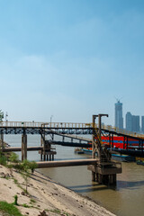 Fototapeta premium Vertical View of River Gangway and Industrial Dock