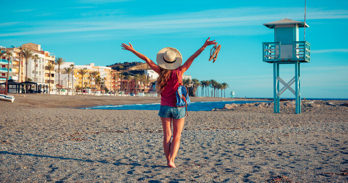 Happy woman tourist in Spain, costa tropical, Andalusia
