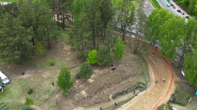 Aerial View of Motocross Race with Bikes on Dirt Track