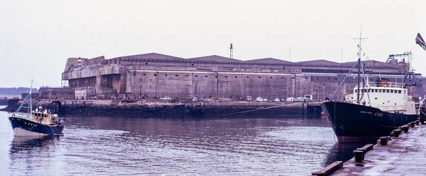 Lorient submarine base, France, August 1973 : fishing vessels moored near the former German U-boat pens on the Keroman naval site