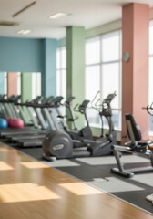 Blurry Gym Equipment Scene Showcases Modern Fitness Center