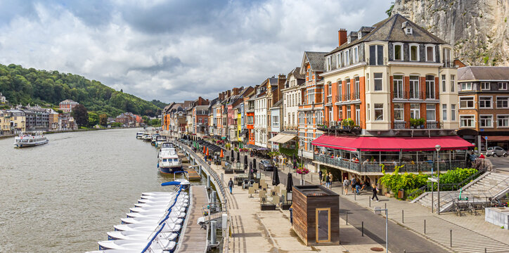 Panorama of historic houses at the waterfront promenade in Dinant, Belgium