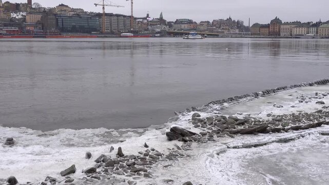 Stockholm, Sweden Due to low water levels in the frozen Baltic Sea, the skeleton of an old warship from the 1600s is exposed in the downtown near the Skeppsholmen and Kastellholmen islands.