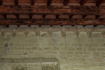 Stone corbels under wooden roof in Santisimo Cristo de Torre Marte hermitage in Astudillo, Palencia © Agustin
