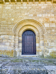 Fototapeta premium Romanesque doorway of San Hipolito church in Tamara de Campos, Palencia, Spain