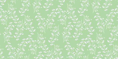 Seamless vector pattern with delicate white floral branches on soft green background. Elegant botanical design for spring textiles, packaging, wallpaper, and wedding decor