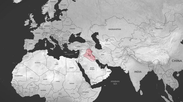 Geographical map highlighting the nation of Iraq in red against a grayscale world view