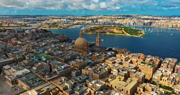 Aerial view of an incredible view of the old town center of Valletta with Basilica of Our Lady of Mount Carmel