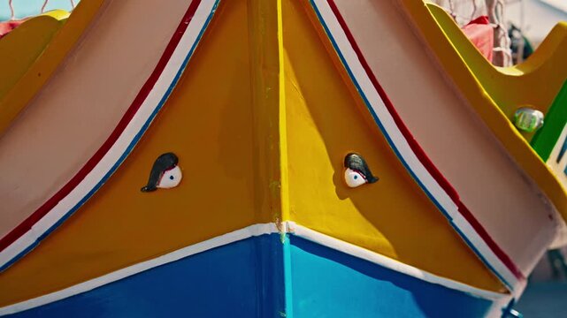 Malta, Marsalokk, - 11.11.2025: Traditional colorful fishing boats with a distinctive shape anchored in the bay