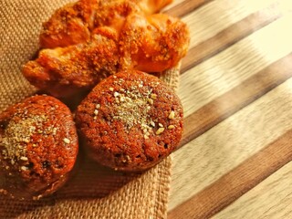 Assorted Sweet Bread on Wooden Background