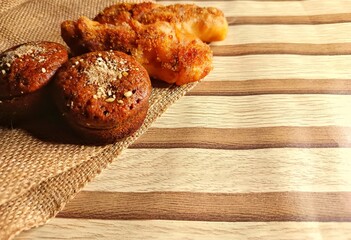 Assorted Sweet Bread on Wooden Background