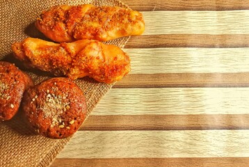 Assorted Sweet Bread on Wooden Background