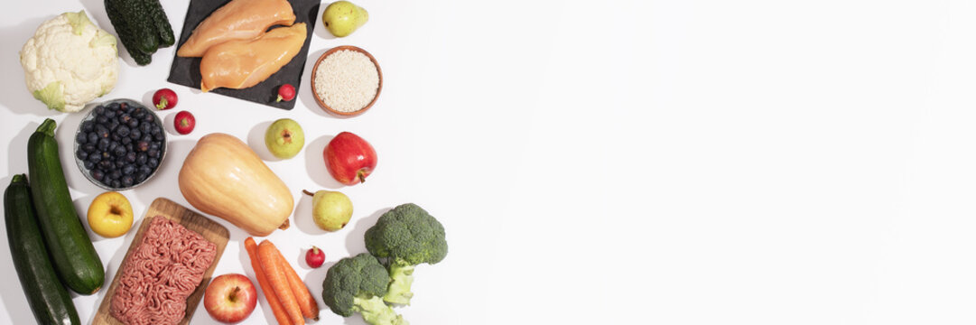 Flat lay banner of fresh low histamine, anti inflammatory and AIP friendly foods