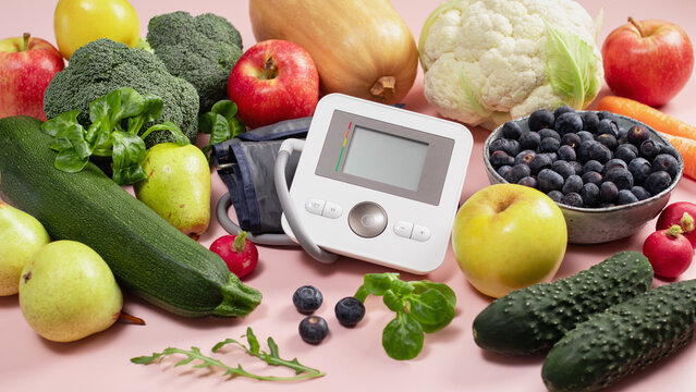 Healthy food and blood pressure monitor, hypertension prevention, DASH diet, heart health, cardiovascular wellness