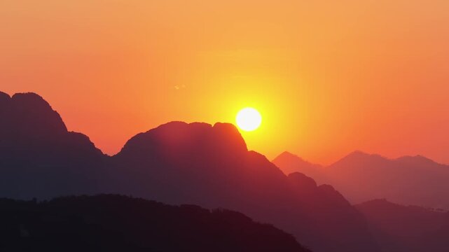 Sunset Over Limestone Mountains in Laos