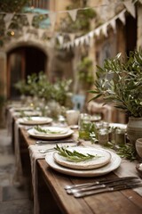 European courtyard party with ceramic plates, olive branches and fabric bunting. Elegant spring table setting with Mediterranean charm.