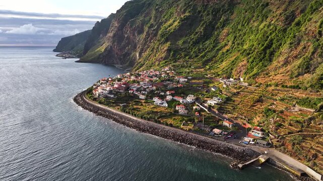 Jardim do Mar coastal village between steep mountain and ocean on Madeira, drone