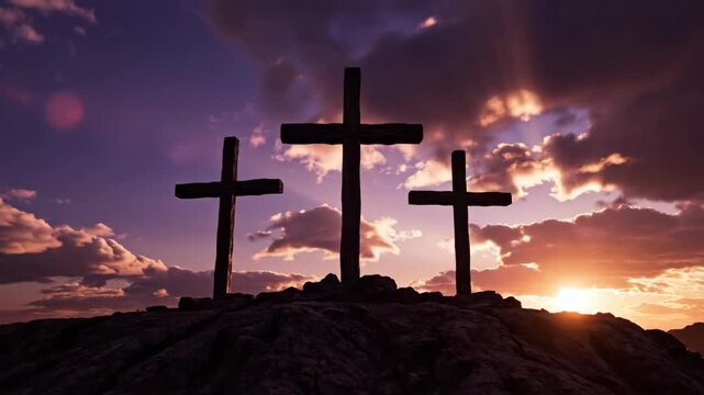 silhouette of three crosses on rocky hill against purple sunset sky. christian symbol of crucifixion and resurrection. easter and good friday concept. religious background.