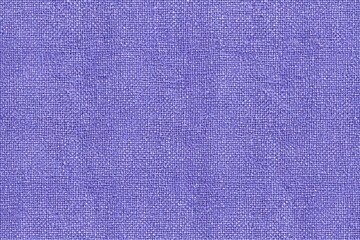 Fototapeta premium Purple fabric texture close up with visible weave pattern and soft textile surface for background or design use in textile and fashion industries.