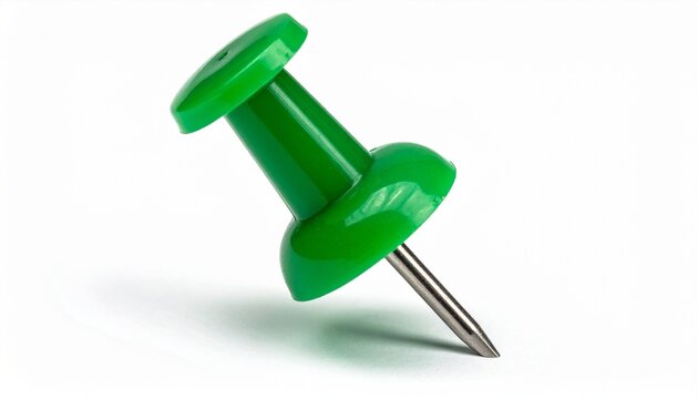 "Green push pin on white surface, office supply tool, organization and bulletin board visual"