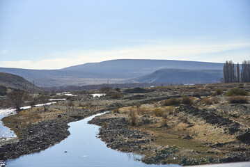 Traveling through the province of Neuquen, Argentina, during wintertime, crossing the Liu Cullin stream.