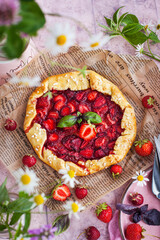 Rustic strawberry open sweet pie (galette)