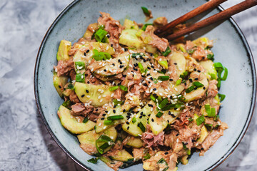 Asian style protein tuna cucmbers and green onion fresh salad