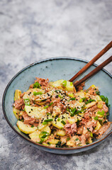 Asian style protein tuna cucmbers and green onion fresh salad